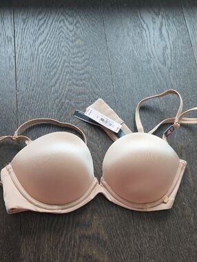 Brand New Victoria's Secret Very Sexy multi-way Nude bra in size 32C.